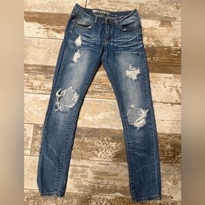 Distressed Blue Jeans by Machine Nouvelle Mode for women.